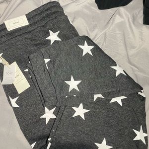 charcoal grey sweats with white stars
